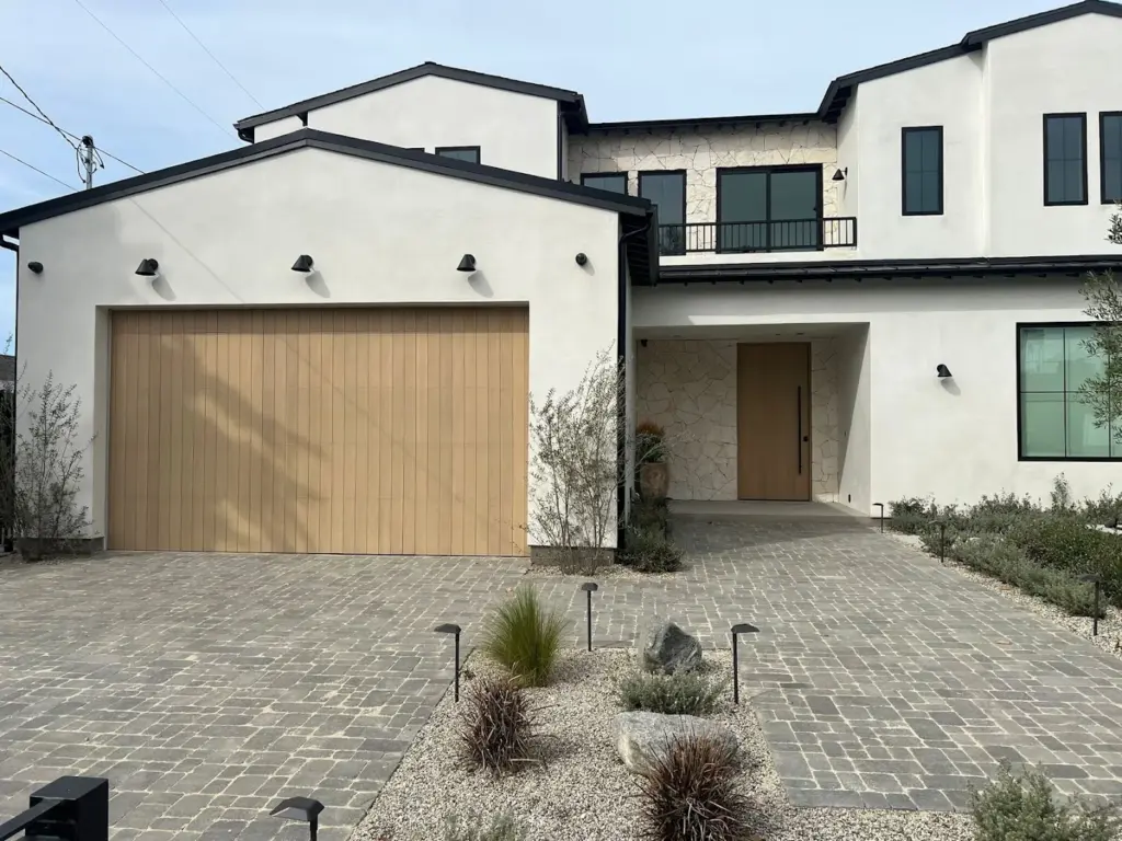 Modern wood-tone garage door installed by Perfection Garage Door in the Renton area